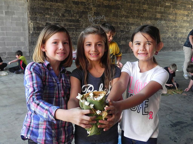 Students from a local intermediate school came to volunteer at the Welcome Center.